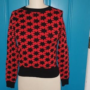 Black, red star sweater. Urban Outfitters